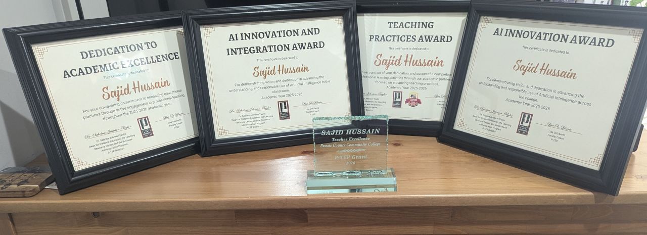 Sajid Hussain receiving faculty awards at Passaic County Community College